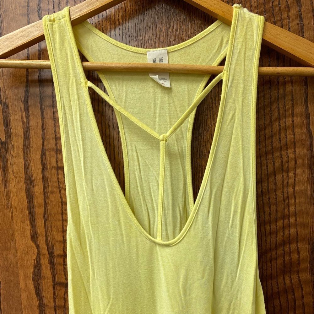 We the Free Yellow Criss cross racer back raw edge knit tunic tank